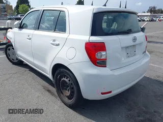 2010 Scion xD with VIN JTKKU4B48AJ053828, listed as a IAAI auction lot 41959804 with 255,337 mi miles. Bid and sale history available at carsss.com. Image 3.