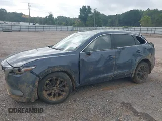 2021 Mazda CX-9 Grand Touring with VIN JM3TCADY2M0509286, listed as a IAAI auction lot 39976279 with 93,588 mi miles and . Bid and sale history available at DreamBid. Image 6.