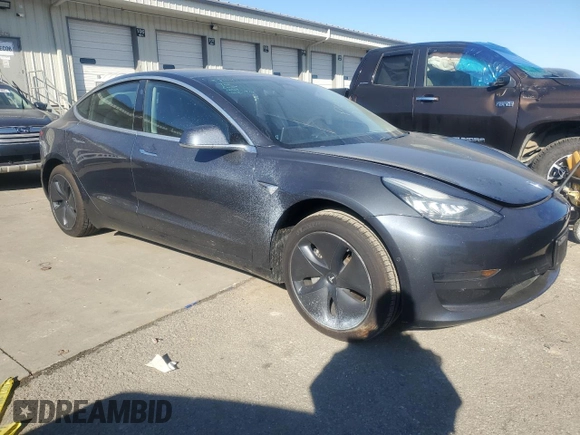 2020 Tesla Model 3 Standard Range Plus with VIN 5YJ3E1EA2LF658205, listed as a Copart auction lot 42481975 with 55,303 mi miles and Salvage Title. Bid and sale history available at DreamBid. Image 4.