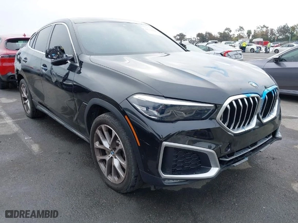2021 BMW X6 xDrive40i with VIN 5UXCY6C08M9G88854, listed as a IAAI auction lot 41733568 with 30,150 mi miles. Bid and sale history available at carsss.com. Image 1.