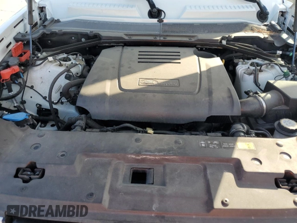 2023 Land Rover Defender S with VIN SALEJ7EXXP2124527, listed as a Copart auction lot 64578725 with 33,816 mi miles and Salvage title. Bid and sale history available at DreamBid. Image 11.