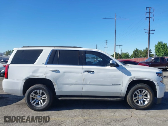 2020 Chevrolet Tahoe LT with VIN 1GNSCBKC0LR195687, listed as a IAAI auction lot 42620344 with 48,059 mi miles and . Bid and sale history available at DreamBid. Image 14.