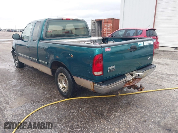 1997 Ford F-150 XL with VIN 1FTEX17LXVNC32588, listed as a IAAI auction lot 40848063 with 210,113 mi miles and . Bid and sale history available at DreamBid. Image 3.
