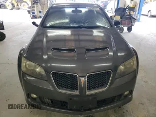 2009 Pontiac G8 z VIN 6G2ER57769L192376, wystawiony jako Copart lot #58634365 z przebiegiem 206 095 mil mil oraz Tytuł czysty. Historia ofert i sprzedaży dostępna na DreamBid. Obrazek 5.