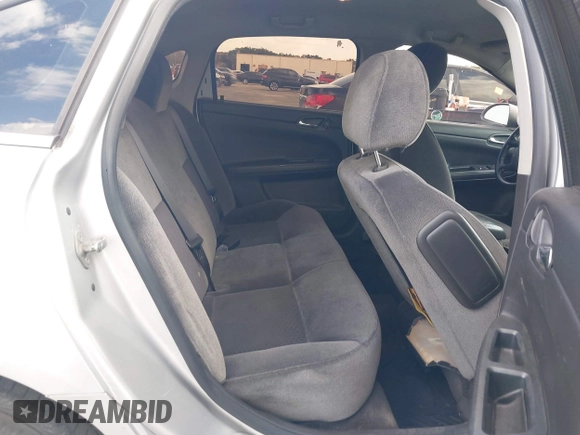 2013 Chevrolet Impala LT with VIN 2G1WG5E30D1148920, listed as a IAAI auction lot 41903310 with 134,349 mi miles and . Bid and sale history available at DreamBid. Image 8.