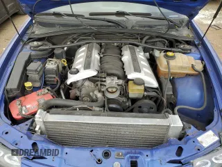 2004 Pontiac GTO z VIN 6G2VX12G04L223636, wystawiony jako Copart lot #56859295 z przebiegiem 183 192 mil mil oraz Szkody całkowita. Historia ofert i sprzedaży dostępna na DreamBid. Obrazek 11.