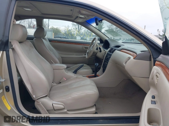 2002 Toyota Solara SE with VIN 2T1CF28P82C595679, listed as a IAAI auction lot 42010315 with 103,986 mi miles. Bid and sale history available at carsss.com. Image 5.