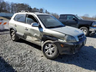 2007 Hyundai Tucson SE with VIN KM8JN12D17U665998, listed as a Copart auction lot 41870815 with 165,467 mi miles and Salvage Title. Bid and sale history available at carsss.com. Image 4.