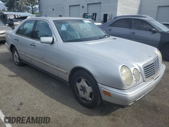 1998 Mercedes-Benz E with VIN WDBJF70F6WA643471, listed as a Copart auction lot 77189934 with 251,579 mi miles and Clean Title. Bid and sale history available at DreamBid. Image 4.