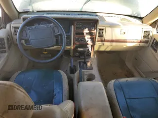 1995 Jeep Grand Cherokee Limited with VIN 1J4GZ78Y7SC730118, listed as a Copart auction lot 76031964 with 184,074 mi miles and Salvage Title. Bid and sale history available at carsss.com. Image 8.