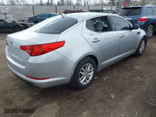 2012 Kia Optima LX with VIN KNAGM4A70C5280464, listed as a IAAI auction lot 41881578 with 141,494 mi miles. Bid and sale history available at carsss.com. Image 4.
