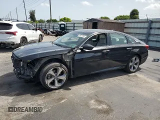 2018 Honda Accord Touring with VIN 1HGCV1F94JA022722, listed as a Copart auction lot 59628365 with 134,695 mi miles and Salvage title. Bid and sale history available at DreamBid. Image 1.