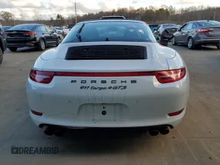 2016 Porsche 911 4S with VIN WP0BB2A93GS136097, listed as a Copart auction lot 76078574 with 14,208 mi miles and Salvage Title. Bid and sale history available at DreamBid. Image 6.