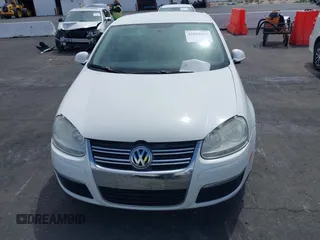 2010 Volkswagen Jetta Sedan S with VIN 3VWJZ7AJ9AM037277, listed as a IAAI auction lot 42044404 with 129,823 mi miles. Bid and sale history available at carsss.com. Image 6.