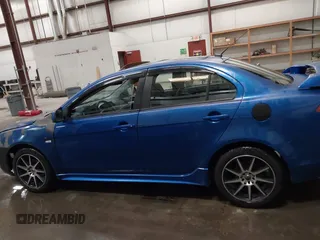 2009 Mitsubishi Lancer ES with VIN JA3AU26U29U036243, listed as a IAAI auction lot 41952044 with 181,650 mi miles. Bid and sale history available at carsss.com. Image 14.