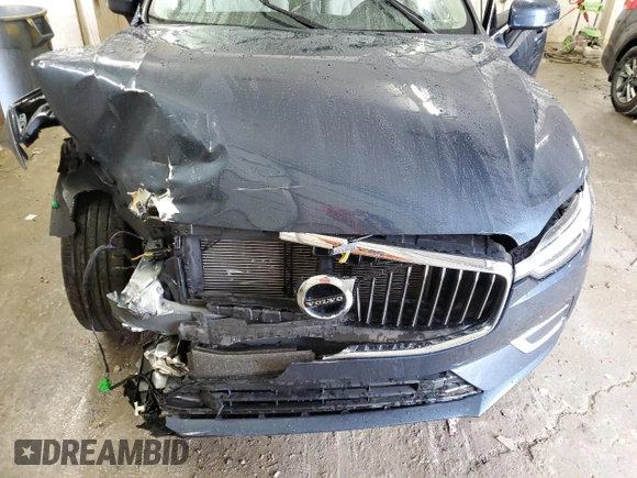 2021 Volvo XC60 Inscription с VIN YV4102DLXM1737403, выставлен на аукционе Copart как лот 84945084 с пробегом 19 900 миль миль и Списание • Salvage title. История ставок и продаж доступна на DreamBid. Изображение 12.