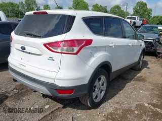 2013 Ford Escape SE with VIN 1FMCU9GX8DUA11623, listed as a IAAI auction lot 42453427 with 157,487 mi miles and . Bid and sale history available at DreamBid. Image 4.