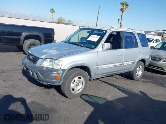 1999 Honda CR-V EX with VIN JHLRD1861XC007657, listed as a IAAI auction lot 42004759 with 180,078 mi miles. Bid and sale history available at carsss.com. Image 13.