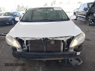 2011 Toyota Corolla L with VIN JTDBU4EE9B9131113, listed as a IAAI auction lot 42028423 with 191,157 mi miles. Bid and sale history available at carsss.com. Image 6.