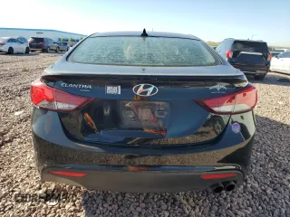 2014 Hyundai Elantra Coupe with VIN KMHDH6AH2EU029402, listed as a Copart auction lot 73036614 with 106,749 mi miles and Salvage Title. Bid and sale history available at carsss.com. Image 6.