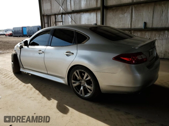 2011 Infiniti M with VIN JN1BY1APXBM324638, listed as a Copart auction lot 51014985 with 194,447 mi miles and Salvage title. Bid and sale history available at DreamBid. Image 2.