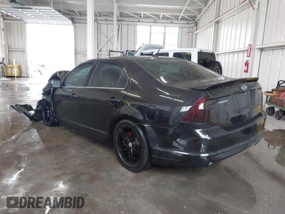 2012 Ford Fusion SE z VIN 3FAHP0HA5CR403929, wystawiony jako IAAI lot #42353429 z przebiegiem 208 668 mil mil oraz . Historia ofert i sprzedaży dostępna na DreamBid. Obrazek 3.