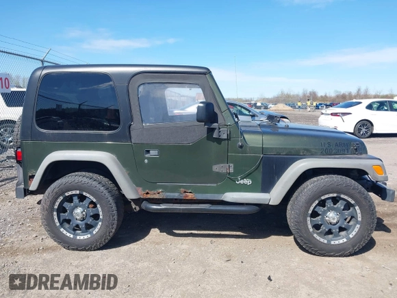 2006 Jeep Wrangler SE with VIN 1J4FA29116P763914, listed as a IAAI auction lot 42140140 with 107,161 mi miles. Bid and sale history available at carsss.com. Image 14.