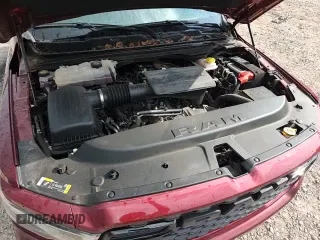 2025 Ram 1500 Tradesman with VIN 1C6RRFGG7SN606380, listed as a Copart auction lot 64974215 with 15,603 mi miles and Salvage title. Bid and sale history available at DreamBid. Image 13.