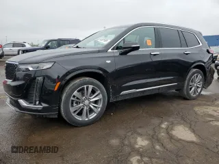 2022 Cadillac XT6 Premium Luxury z VIN 1GYKPDRSXNZ161744, wystawiony jako Copart lot #54901995 z przebiegiem 24 994 mil mil oraz Szkoda całkowita • Salvage title. Historia ofert i sprzedaży dostępna na DreamBid. Obrazek 1.
