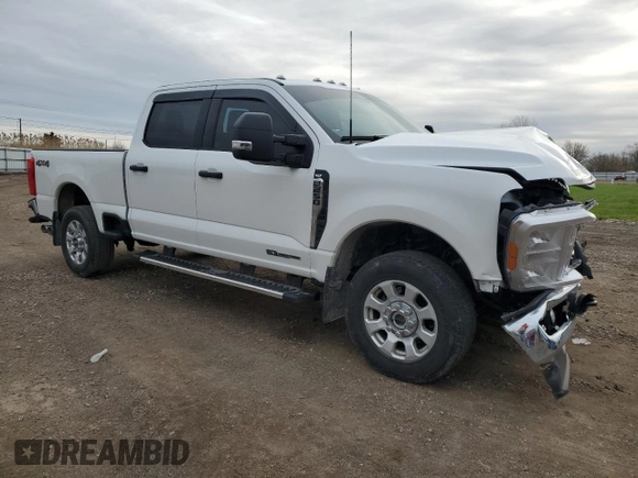 2023 Ford F-250 XL with VIN 1FT7W2BT9PED28983, listed as a Copart auction lot 51587385 with 29,364 mi miles and Salvage Title. Bid and sale history available at DreamBid. Image 4.