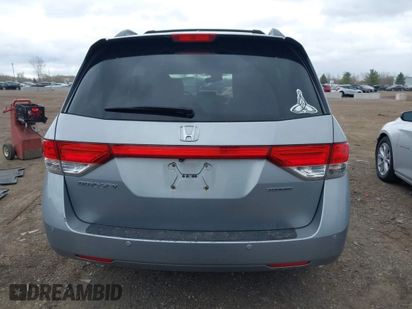 2016 Honda Odyssey Touring Elite with VIN 5FNRL5H99GB107896, listed as a IAAI auction lot 42040395 with 162,120 mi miles and . Bid and sale history available at carsss.com. Image 16.