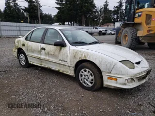 2002 Pontiac Sunfire SE z VIN 1G2JB524327294701, wystawiony jako Copart lot #73310254 z przebiegiem Nie podano mil oraz Czysty tytuł • Clean title. Historia ofert i sprzedaży dostępna na DreamBid. Obrazek 4.