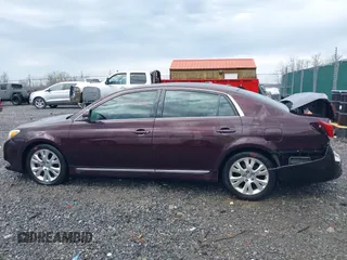 2012 Toyota Avalon with VIN 4T1BK3DB7CU451855, listed as a IAAI auction lot 41964456 with 153,921 mi miles and . Bid and sale history available at DreamBid. Image 14.