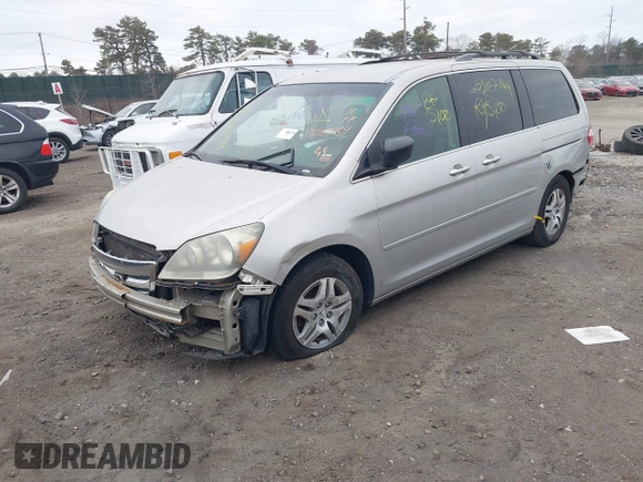 2005 Honda Odyssey EX with VIN 5FNRL38435B071998, listed as a IAAI auction lot 41808601 with 999,999 mi miles. Bid and sale history available at carsss.com. Image 2.