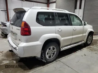 2004 Lexus GX 470 z VIN JTJBT20X240059501, wystawiony jako Copart lot #45146365 z przebiegiem 190 145 mil mil oraz Tytuł czysty. Historia ofert i sprzedaży dostępna na DreamBid. Obrazek 3.