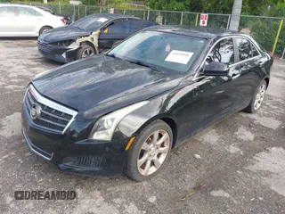 2013 Cadillac ATS with VIN 1G6AA5RX4D0174127, listed as a IAAI auction lot 42619918 with 119,174 mi miles and . Bid and sale history available at DreamBid. Image 17.