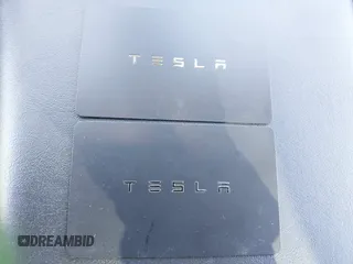 2022 Tesla Model Y Long Range with VIN 7SAYGDEE6NF480471, listed as a IAAI auction lot 41985797 with 82,777 mi miles and . Bid and sale history available at DreamBid. Image 11.