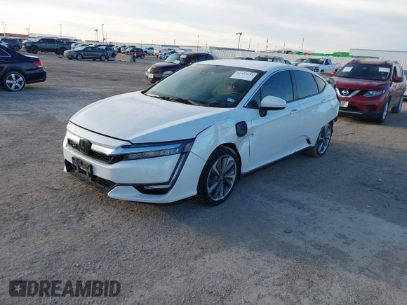 2018 Honda Clarity z VIN JHMZC5F14JC002263, wystawiony jako IAAI lot #41353651 z przebiegiem 153 401 mil mil oraz . Historia ofert i sprzedaży dostępna na DreamBid. Obrazek 2.