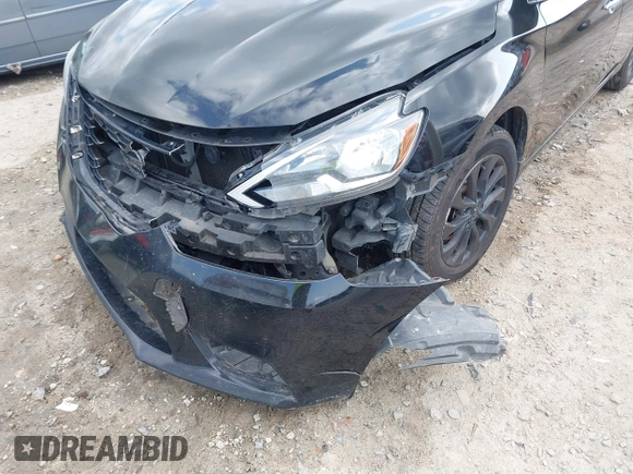 2018 Nissan Sentra S with VIN 3N1AB7AP5JY211272, listed as a IAAI auction lot 41941030 with 264,501 mi miles and . Bid and sale history available at DreamBid. Image 6.