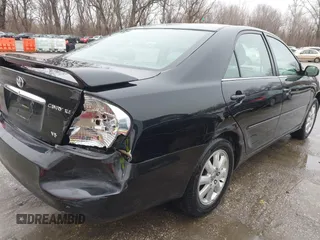 2004 Toyota Camry LE with VIN 4T1BF32K84U074364, listed as a IAAI auction lot 41479264 with 265,865 mi miles. Bid and sale history available at carsss.com. Image 6.