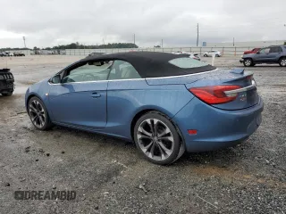 2017 Buick Cascada Premium с VIN W04WH3N59HG063877, выставлен на аукционе Copart как лот 73105404 с пробегом 65 085 миль миль и Списание • Salvage title. История ставок и продаж доступна на DreamBid. Изображение 2.