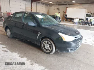 2009 Ford Focus SE with VIN 1FAHP35N69W128084, listed as a IAAI auction lot 42202678 with 290,358 mi miles. Bid and sale history available at carsss.com. Image 1.