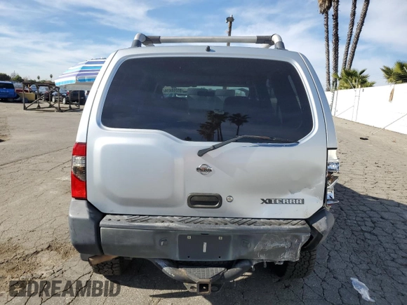2001 Nissan Xterra XE z VIN 5N1ED28T51C513390, wystawiony jako Copart lot #85260414 z przebiegiem 218 377 mil mil oraz Szkoda całkowita • Salvage title. Historia ofert i sprzedaży dostępna na DreamBid. Obrazek 6.