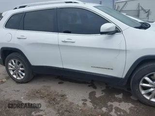 2016 Jeep Cherokee Limited z VIN 1C4PJMDS6GW182082, wystawiony jako IAAI lot #41943408 z przebiegiem 141 796 mil mil oraz . Historia ofert i sprzedaży dostępna na DreamBid. Obrazek 14.