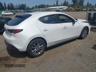 2022 Mazda 3 S with VIN JM1BPAJL4N1518486, listed as a IAAI auction lot 42229314 with 23,235 mi miles and . Bid and sale history available at DreamBid. Image 4.