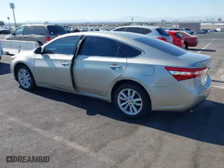 2014 Toyota Avalon Limited with VIN 4T1BK1EBXEU094015, listed as a IAAI auction lot 41415683 with 183,627 mi miles. Bid and sale history available at carsss.com. Image 3.