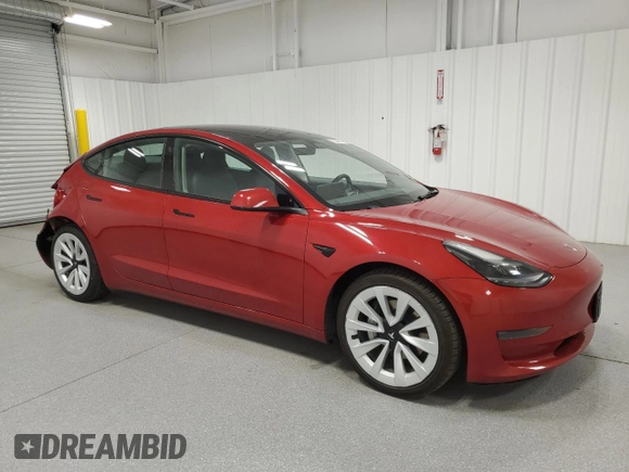 2023 Tesla Model 3 with VIN 5YJ3E1EA6PF455789, listed as a Copart auction lot 54715665 with 64,658 mi miles and Salvage Title. Bid and sale history available at DreamBid. Image 4.