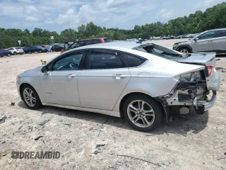 2015 Ford Fusion SE Hybrid with VIN 3FA6P0LU4FR301714, listed as a Copart auction lot 64370525 with 174,076 mi miles and Clean title. Bid and sale history available at DreamBid. Image 2.