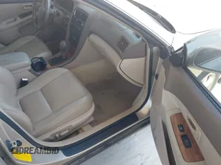 1999 Lexus ES 300 Luxury Sport Sdn with VIN JT8BF28G0X5065317, listed as a IAAI auction lot 42080216 with 163,223 mi miles. Bid and sale history available at carsss.com. Image 5.