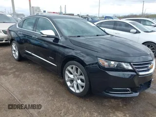 2014 Chevrolet Impala LTZ z VIN 1G1145SL6EU163838, wystawiony jako IAAI lot #42033470 z przebiegiem 115 640 mil mil oraz . Historia ofert i sprzedaży dostępna na DreamBid. Obrazek 1.